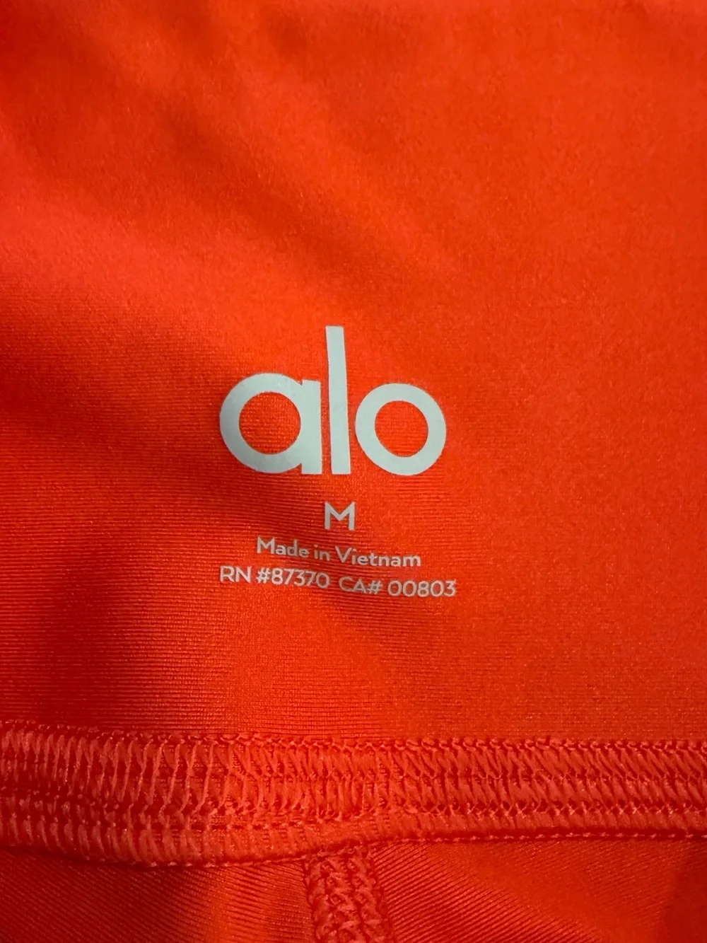 ALO Yoga Bright Coral 7/8 Airlift Leggings